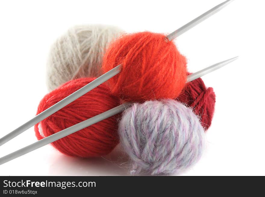 The balls of a wool yarn isolated on a white background. The balls of a wool yarn isolated on a white background