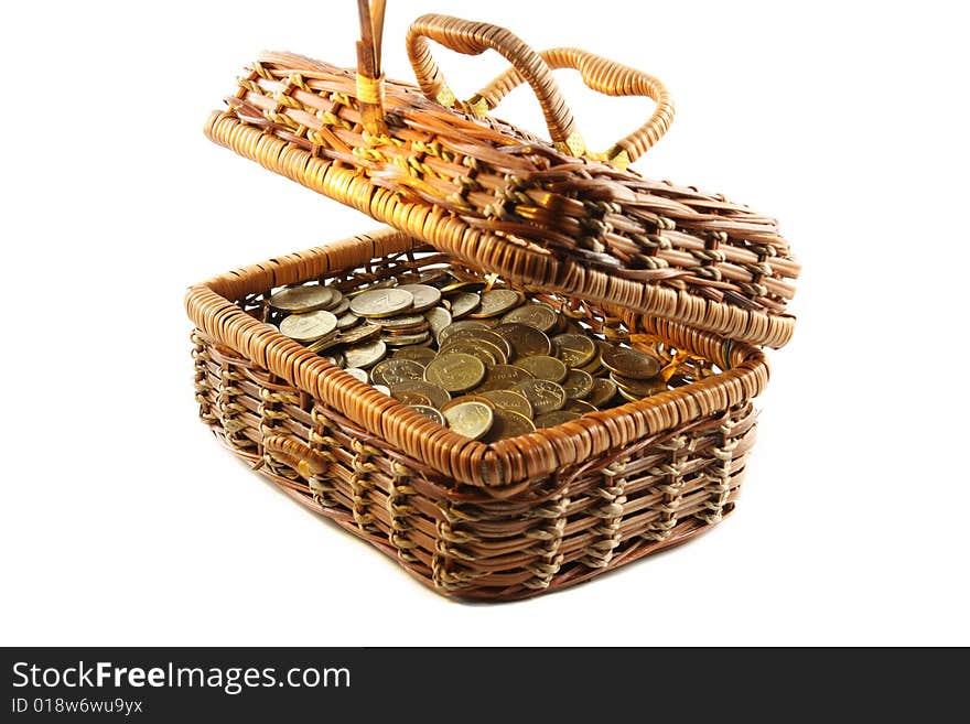 Coins in a casket. Isolated on an white background. Coins in a casket. Isolated on an white background