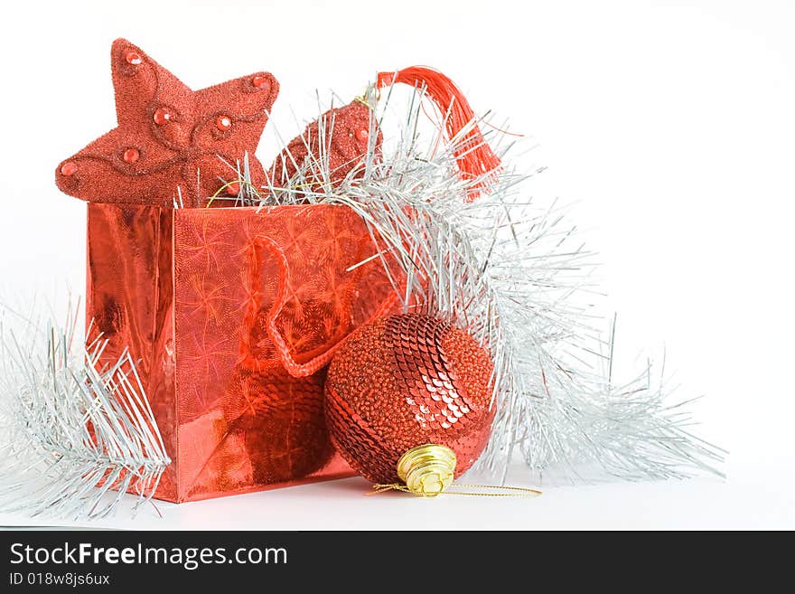 Red Bag With Christmas Toys On White Background