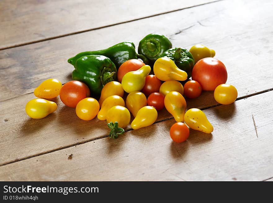 Group of different tomato and green pepper