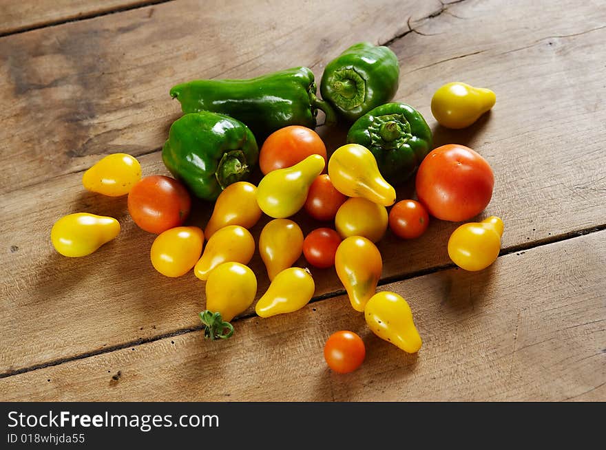 Group of different tomato and green pepper