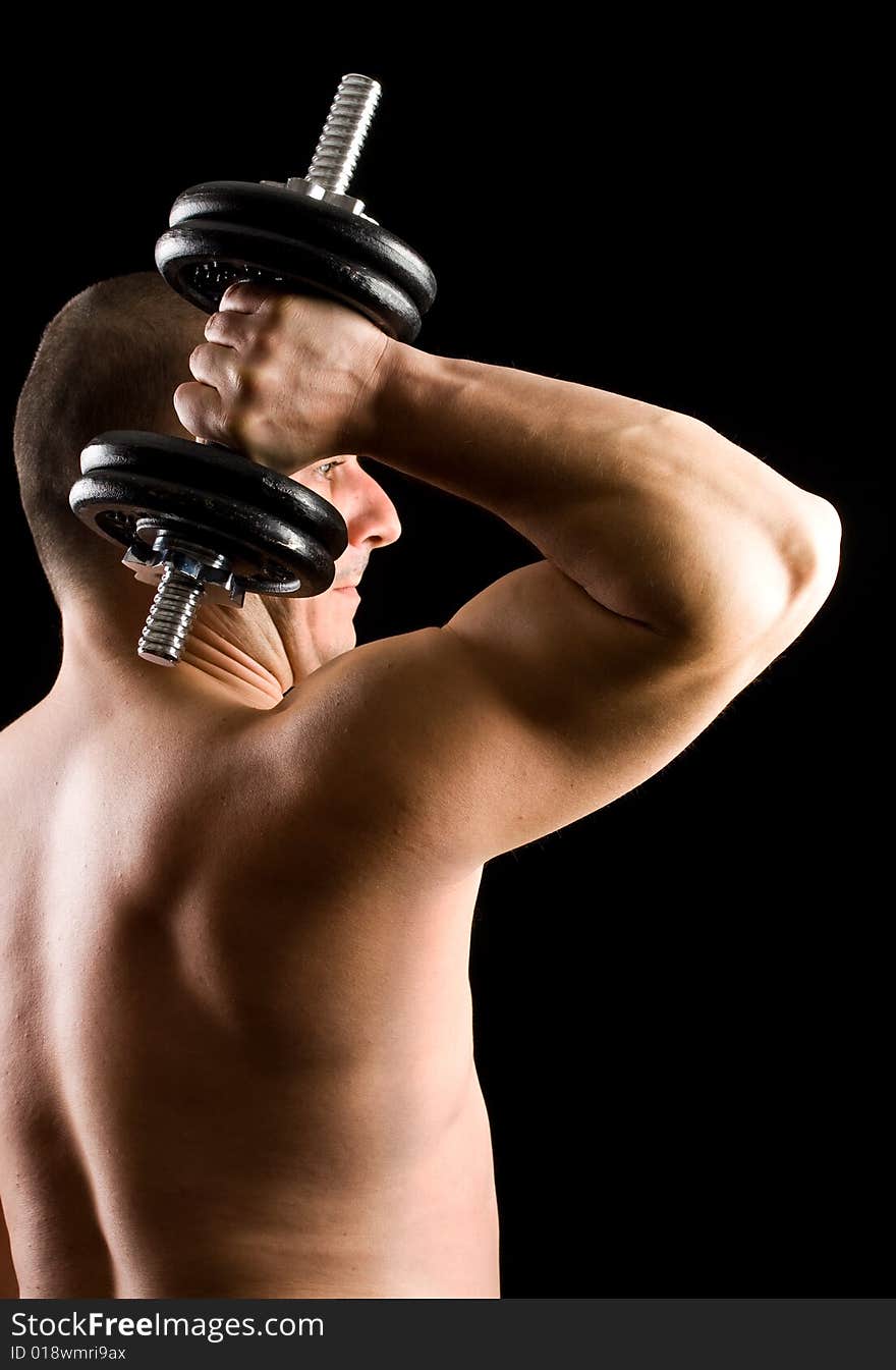 Man Lifting Weights Isolated On Black