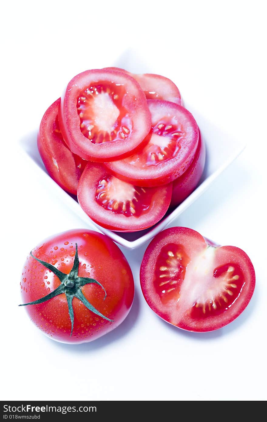 Fresh tomatoes on white background