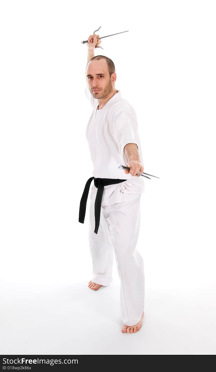 White man doing martial arts on isolated background