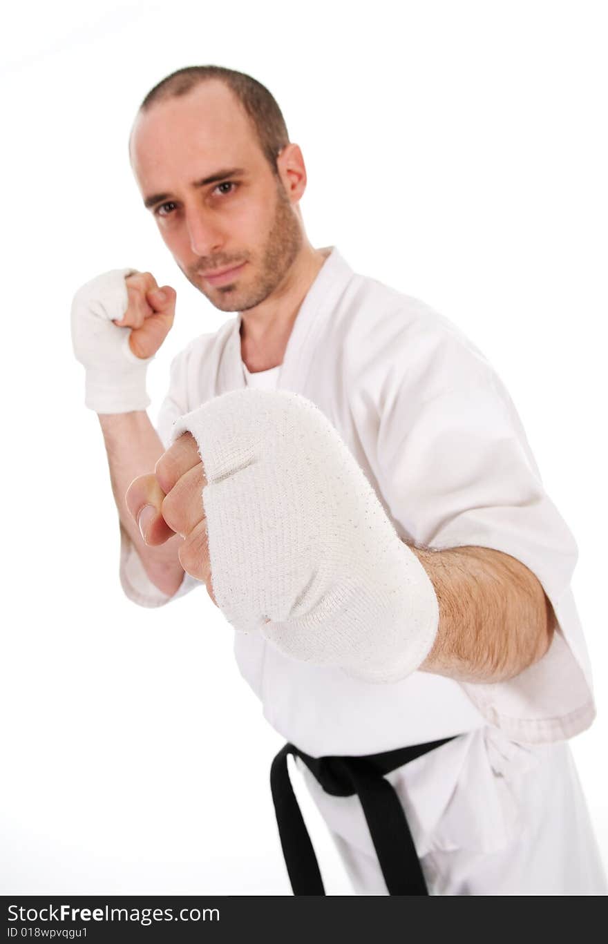 White man doing martial arts on isolated background