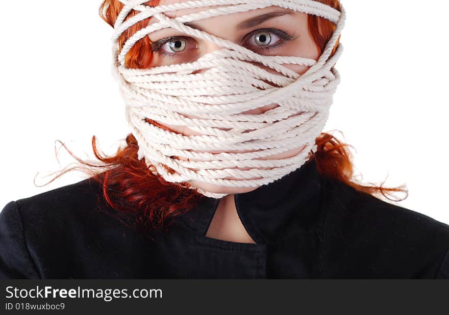 Portrait of a woman with rope on her face