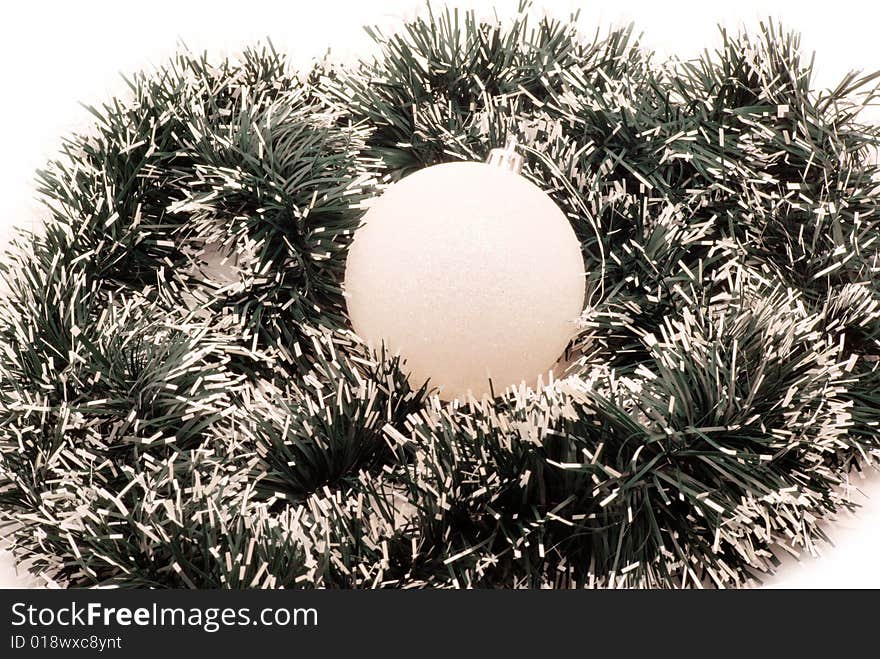 Christmas spheres and tinsel as a background. Christmas spheres and tinsel as a background