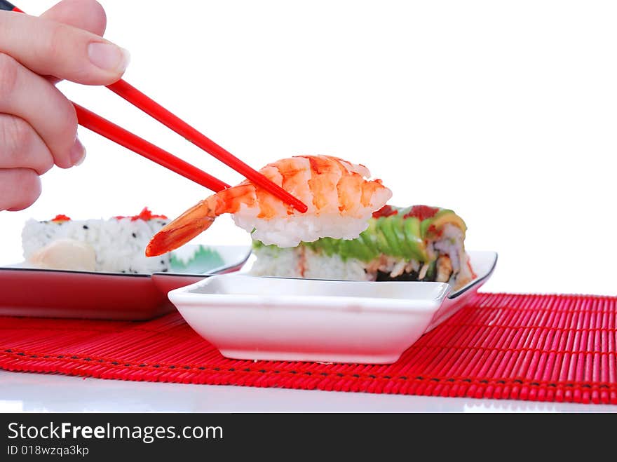 Holding shrimp with chopsticks