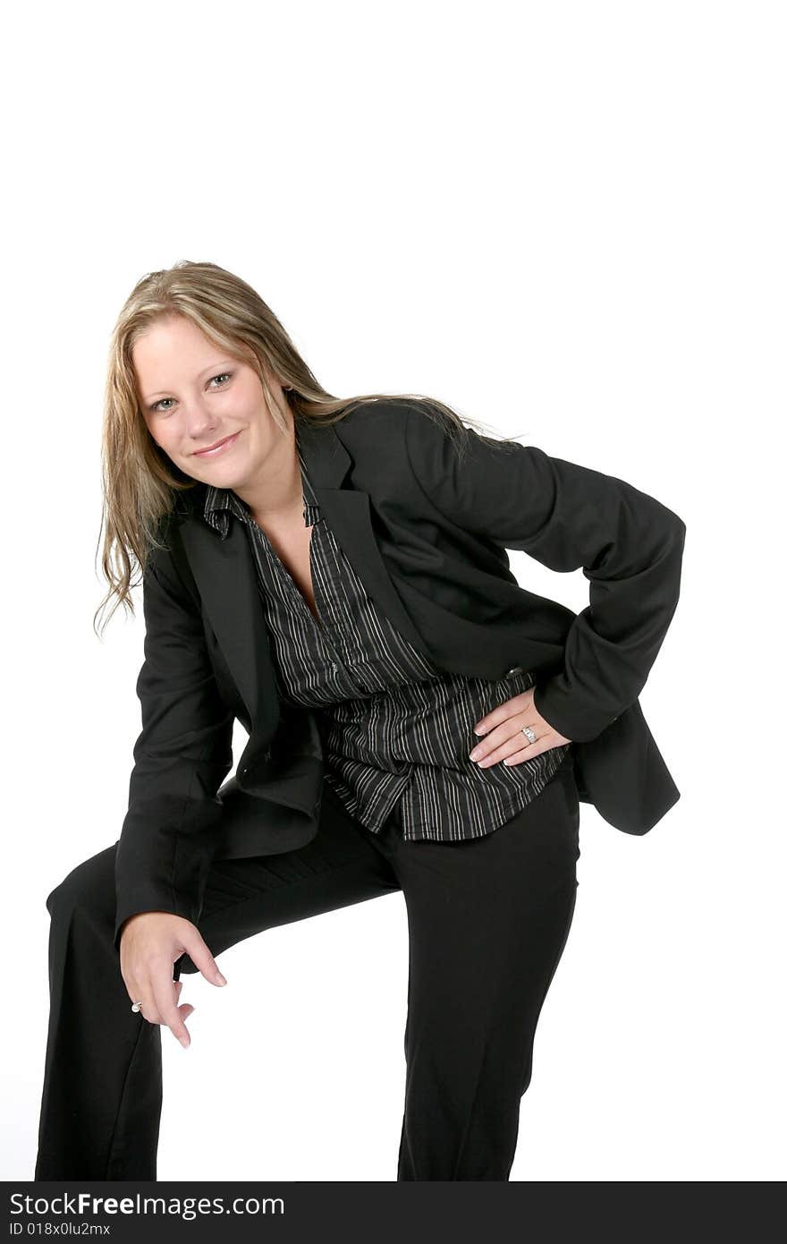 Eager, smiling professional woman in black suit