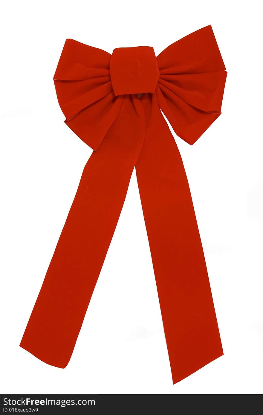 Big red velvet ribbon on white background. Big red velvet ribbon on white background