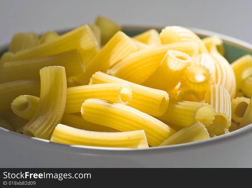 Fresh uncooked raw italian pasta isolated over white