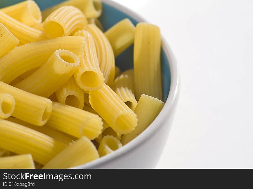 Fresh uncooked raw italian pasta isolated over white