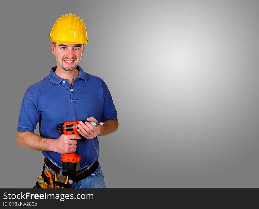 Isolated standing young worker with space for text. Isolated standing young worker with space for text