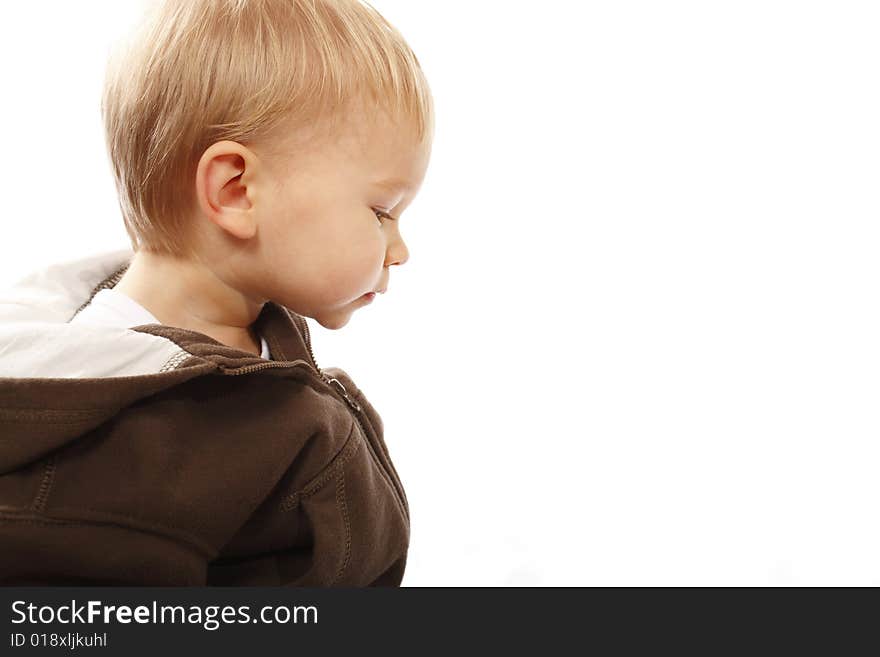 Cute twenty month old toddler holds still long enough to capture his profile. Cute twenty month old toddler holds still long enough to capture his profile.