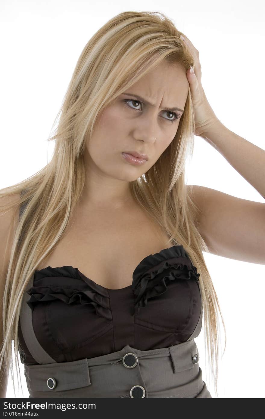 Beautiful woman with a headache on an isolated white background