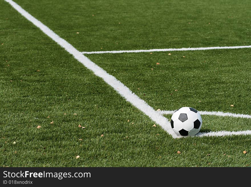 Football in stadium with an artificial covering before the beginning of game