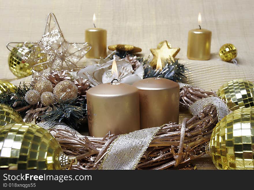 Golden candle and sphere like christmas decoration. Golden candle and sphere like christmas decoration