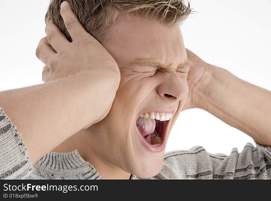 Screaming young man on an isolated white background