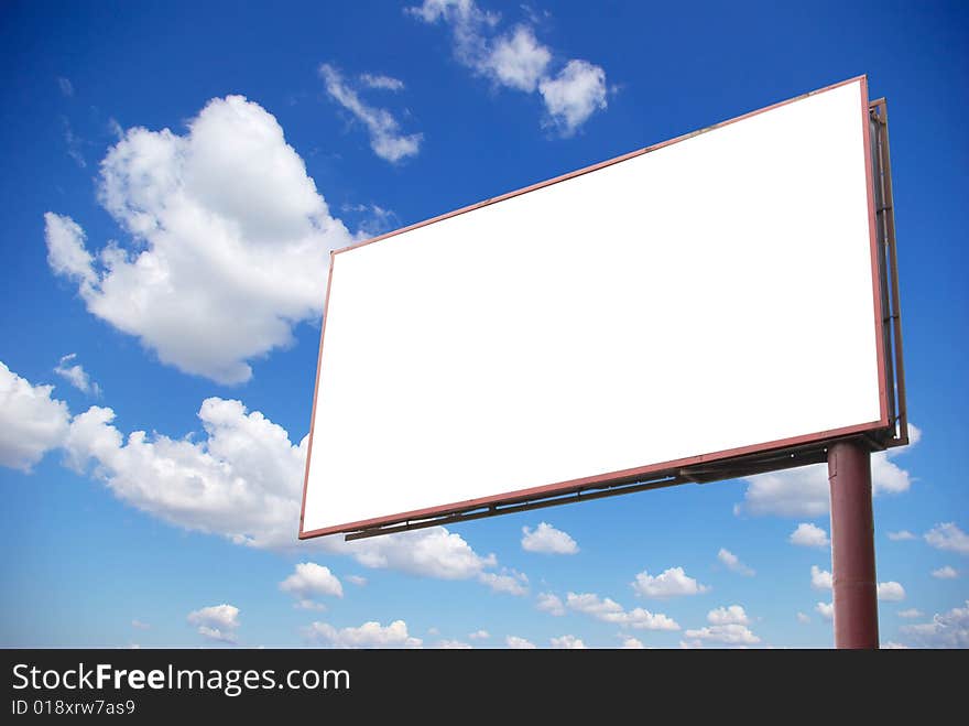 Advertising billboard on sky background