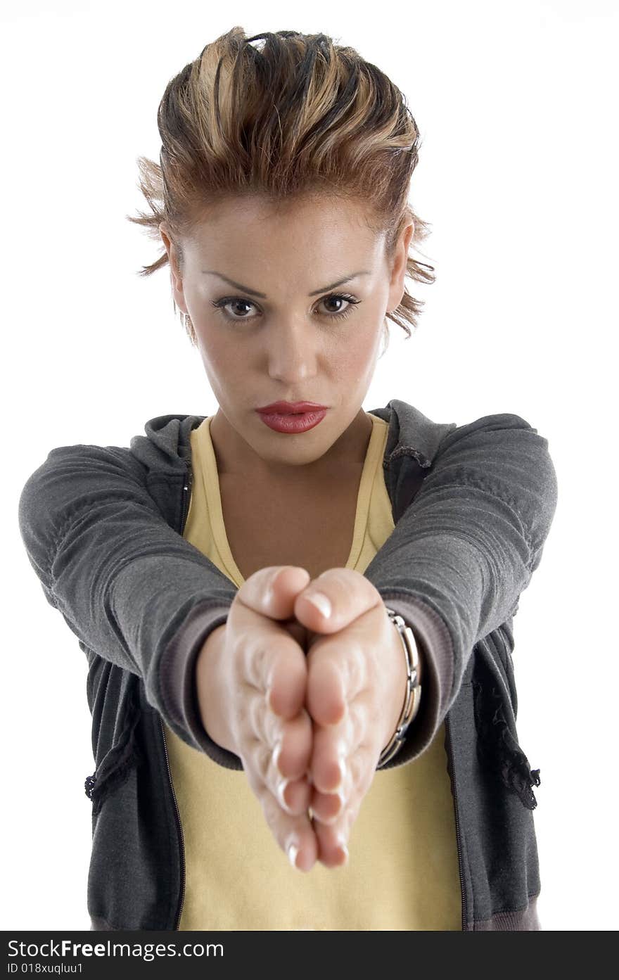 Young woman joint hands on an isolated white background