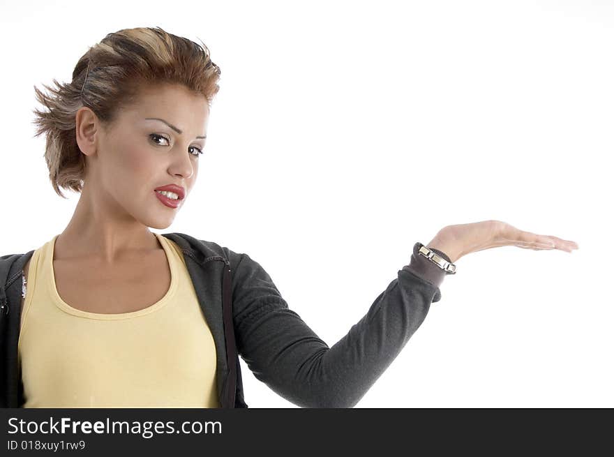 Attractive woman with open palm on an isolated background