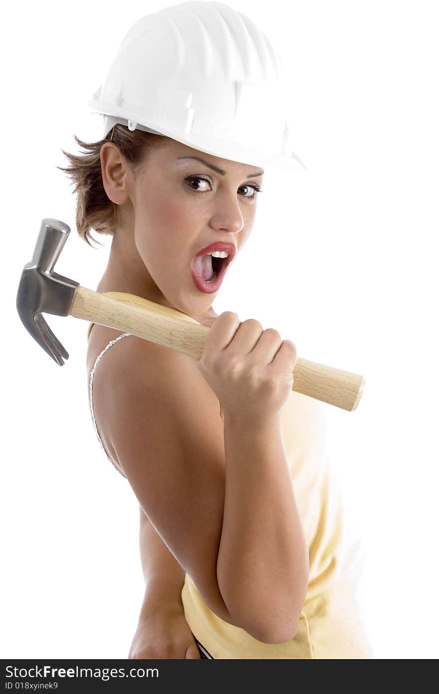 Architect with hammer against white background