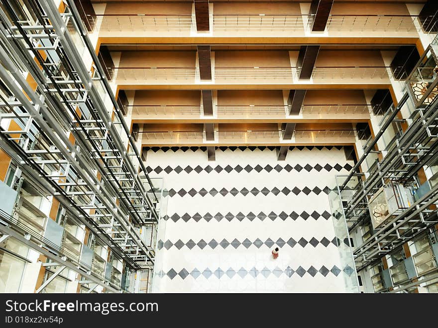 Hall in modern office building with lifts