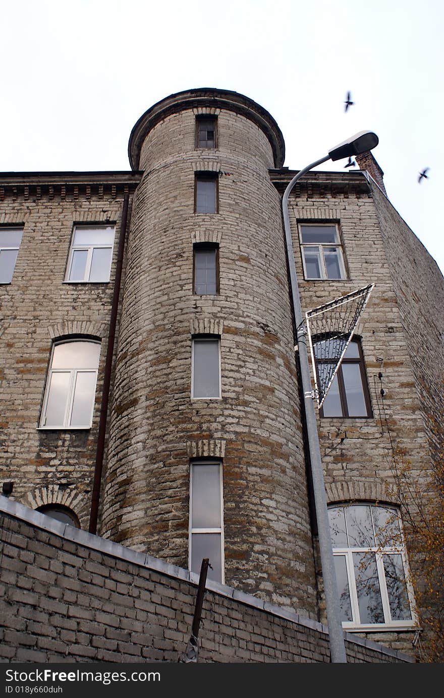 Gray brick house on the street in Tallinn. Gray brick house on the street in Tallinn