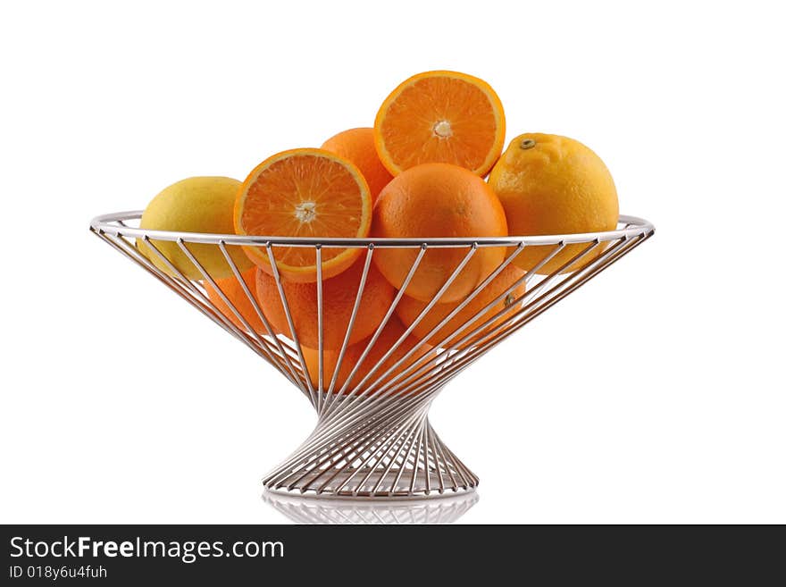 Orange and Lemon on fruit basket isolated on white. Orange and Lemon on fruit basket isolated on white