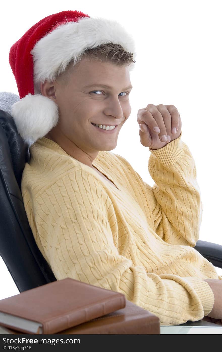 Handsome Male Wearing Santa Hat Looking At Camera