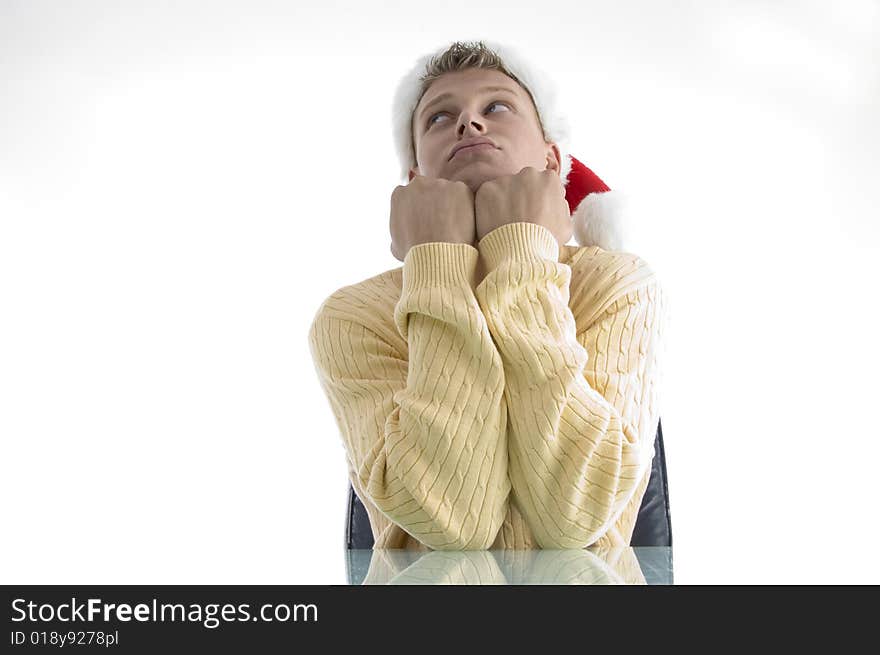 Sad man wearing christmas hat with white background