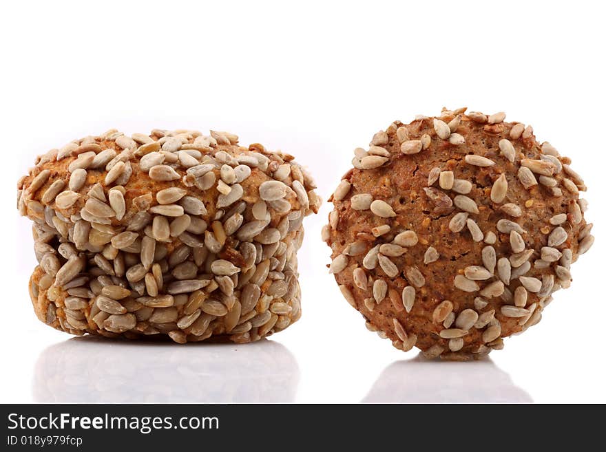 Sunflower seed bread aerial view and askance on white background