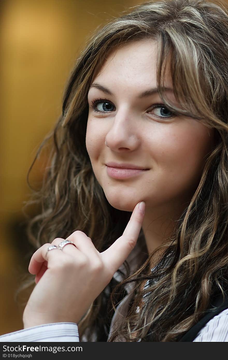 Portret of an nice young girl with a brown hair. Portret of an nice young girl with a brown hair