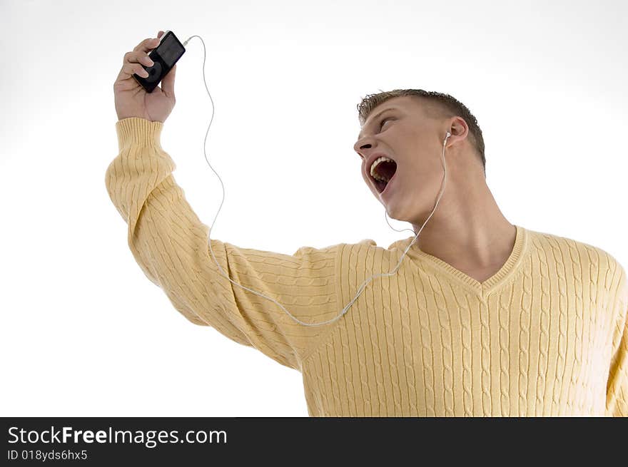 Man enjoying music with ipod on an isolated background