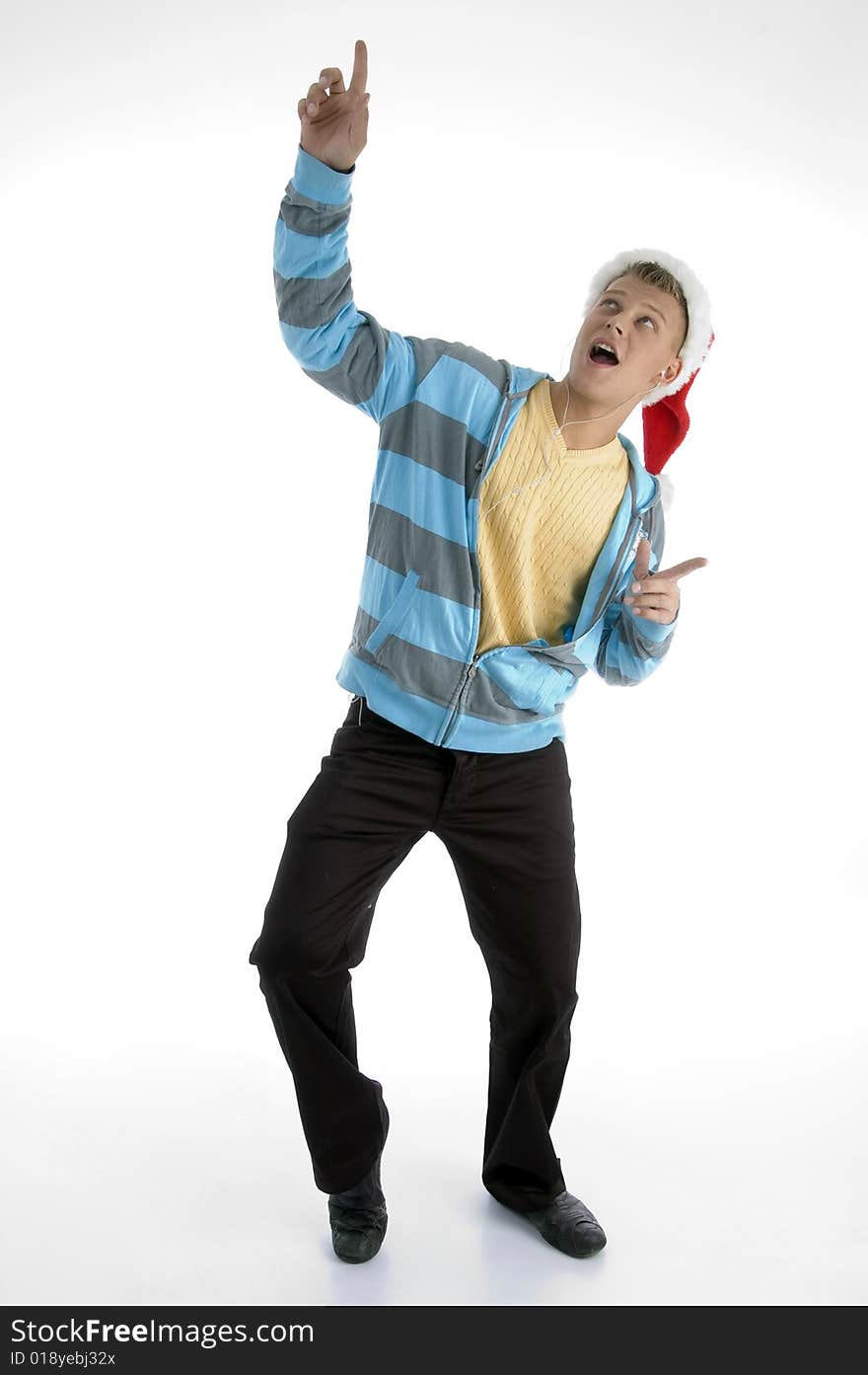 Pointing man with christmas hat against white background