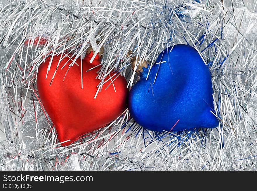 Christmas red and blue heart ornaments, on white background. Christmas red and blue heart ornaments, on white background.