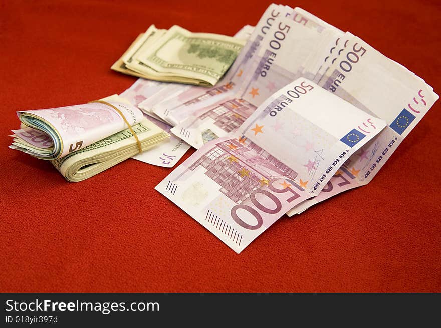 Pile of various money; euro and US dollar. Pile of various money; euro and US dollar