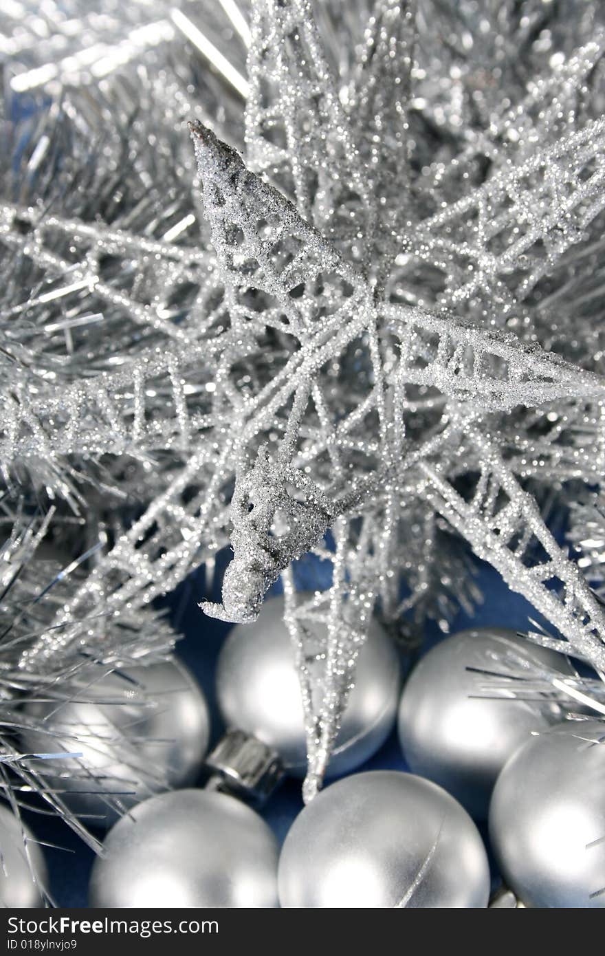 Silver Christmas star decoration, balls and tinsel