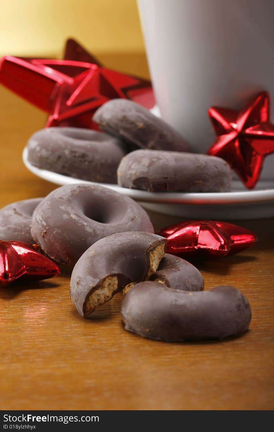 Milk and cookies for santa on table with gold background