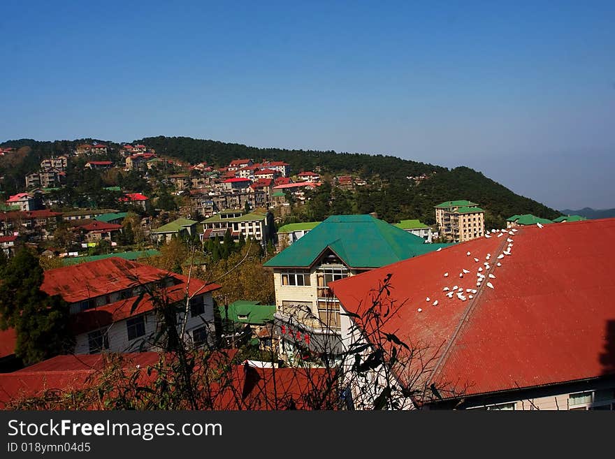 The villa on the mountains with blue sky background.