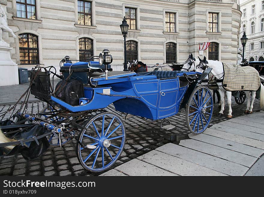 The dark blue carriage