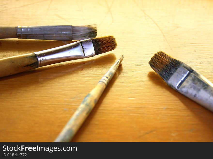 Paintbrushes on wood