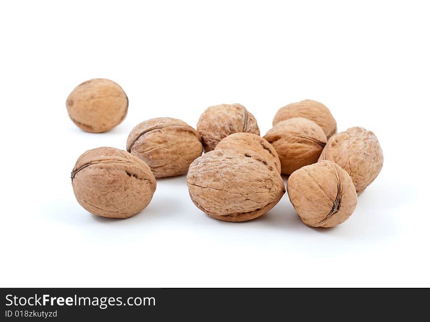 Few walnuts isolated on the white background