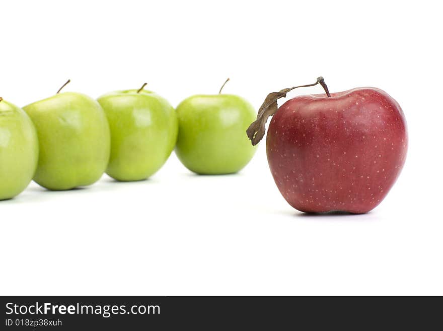 Group of green apples with one red. Group of green apples with one red