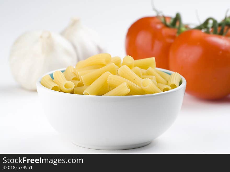 Fresh uncooked raw italian pasta isolated over white