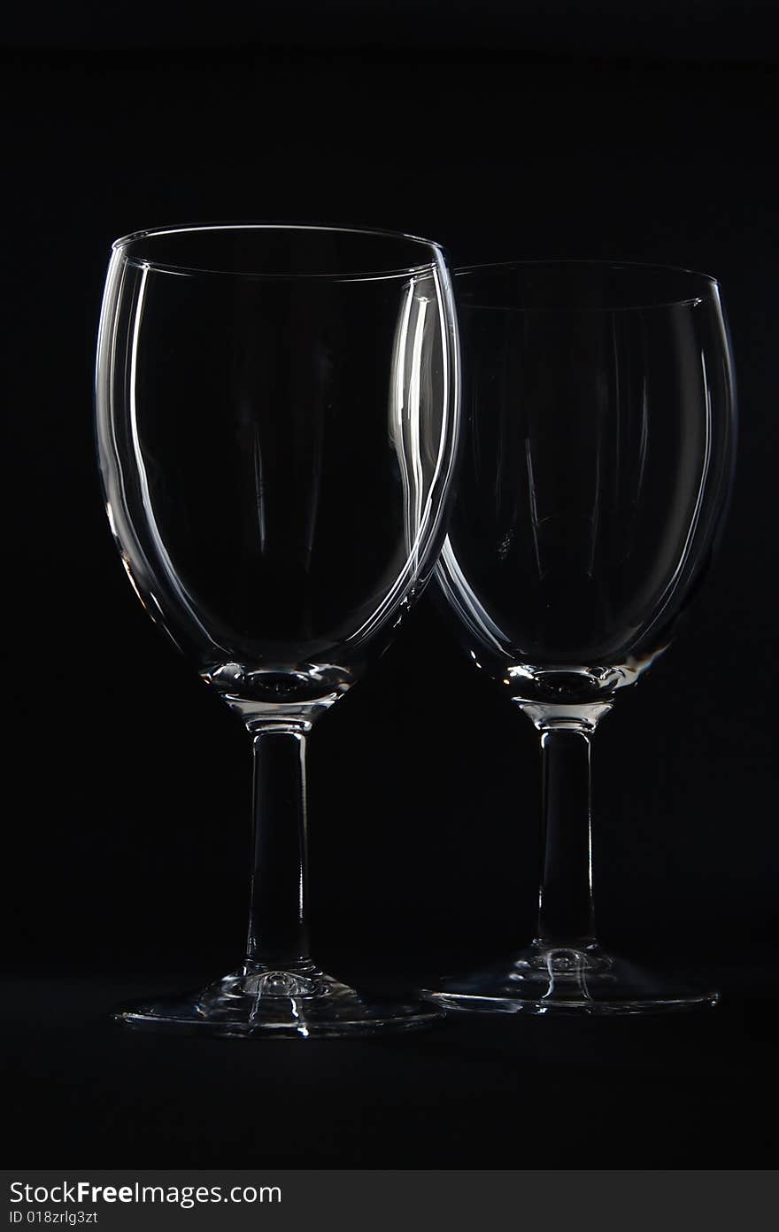 Two empty wine glasses.