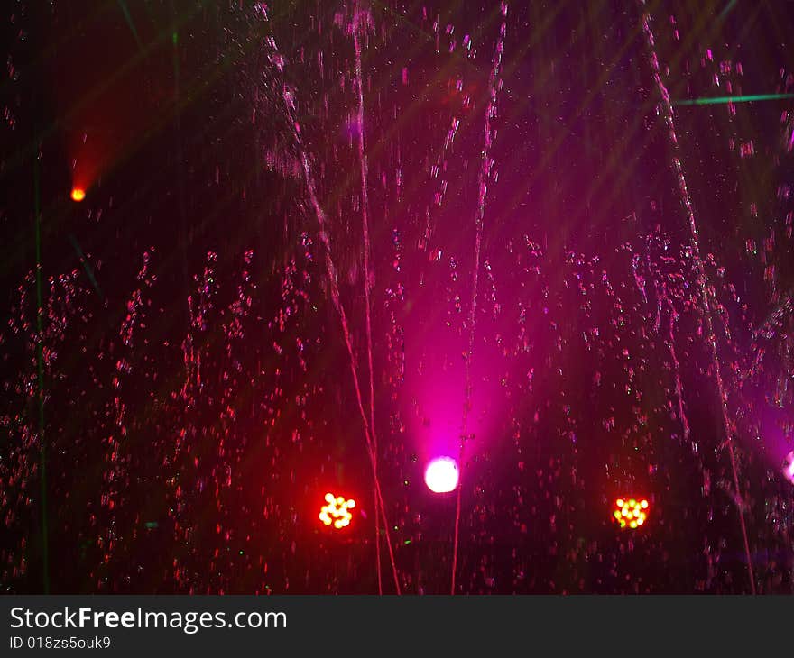 Fountain and purple lights