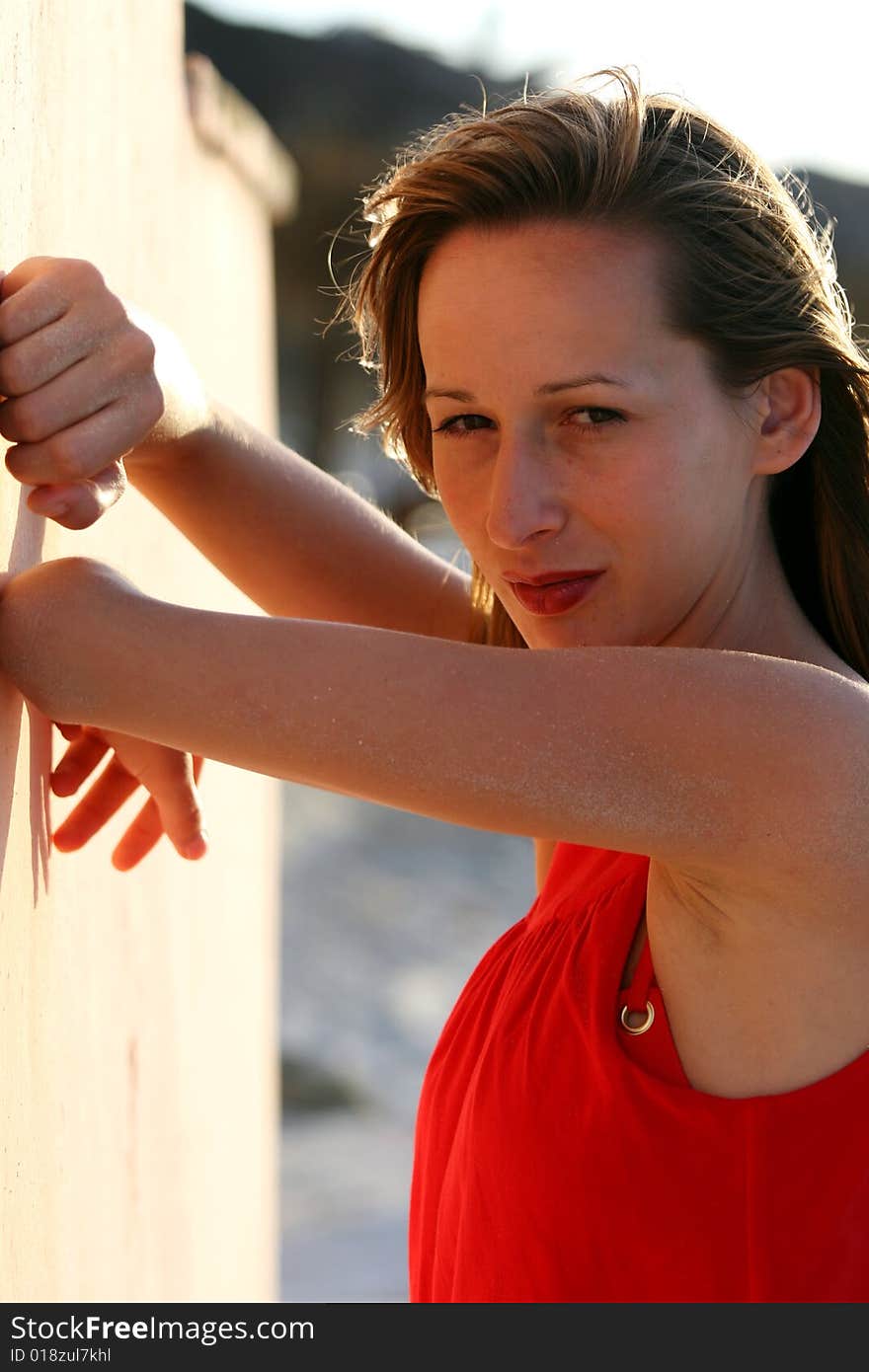 Woman posing in red dress