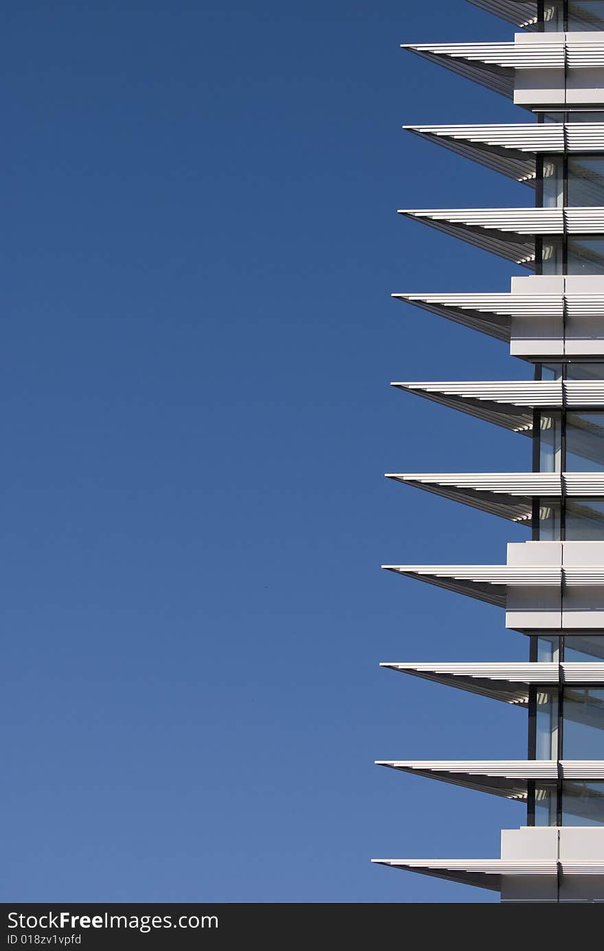 An interisting detail of a bulding with a nice blue sky in the background. An interisting detail of a bulding with a nice blue sky in the background