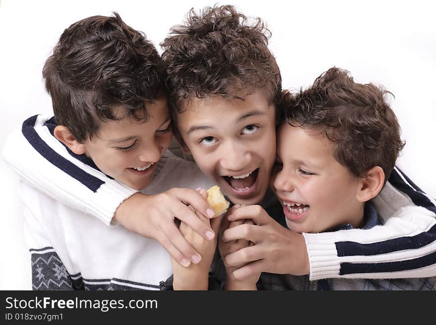 Three brothers with looking forward haircut